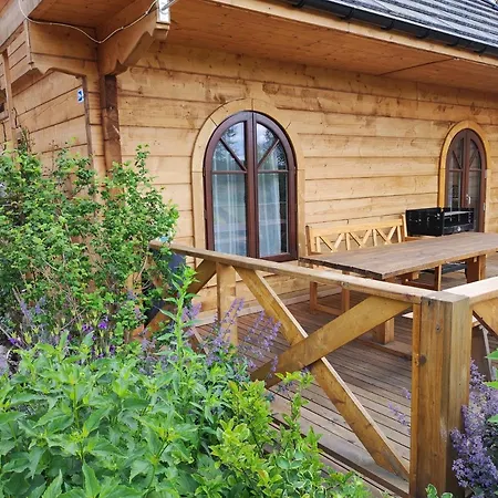 Woodorf-drewnem: Riverside Log With Outdoor Activities Holiday home Ustka